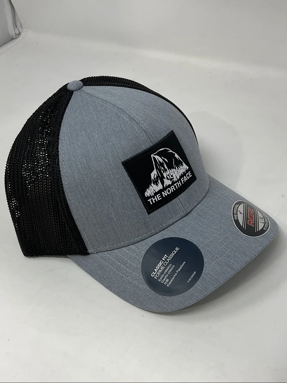 The North Face Gray Front Black Mesh Trucker Hat